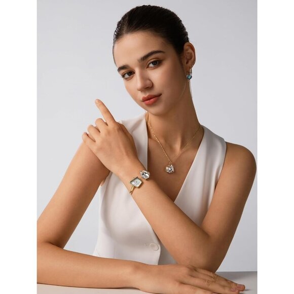 Women\'s Gold Cuff Bangle Quartz Watch Shaped Mineral Case Stainless Steel main image 4